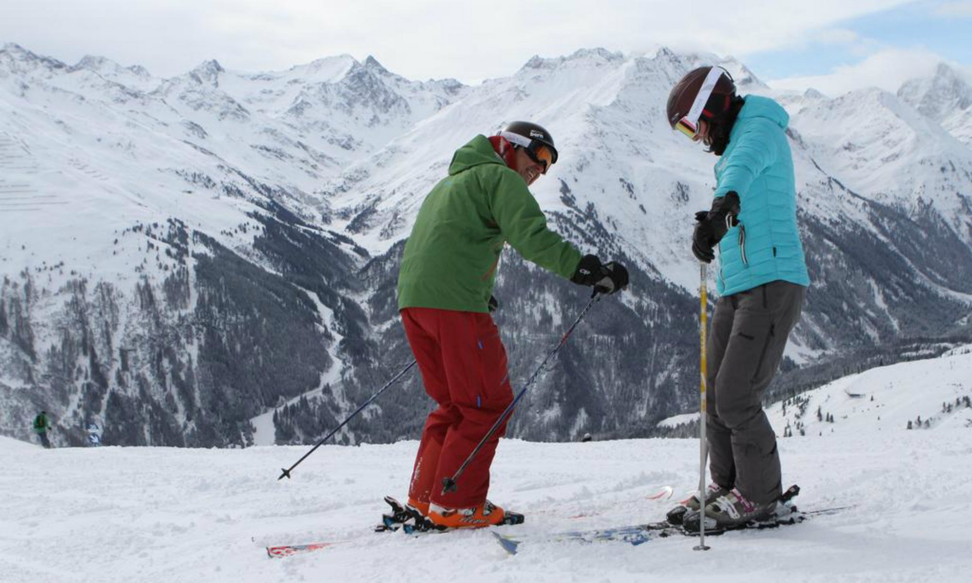 A private ski instructor and a skier on a slope in the Austrian resort Lech.