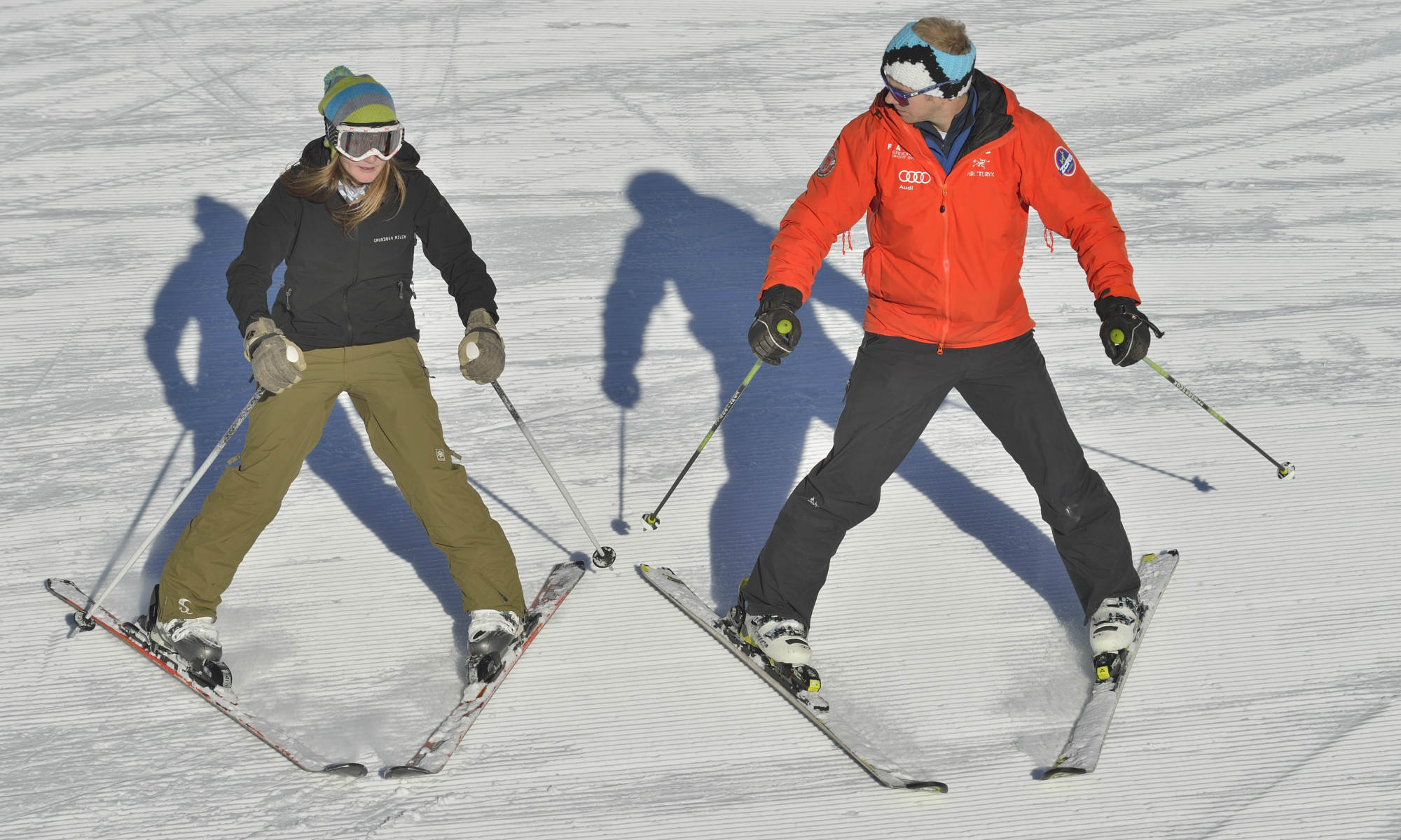 An adult skier during a beginners lesson.