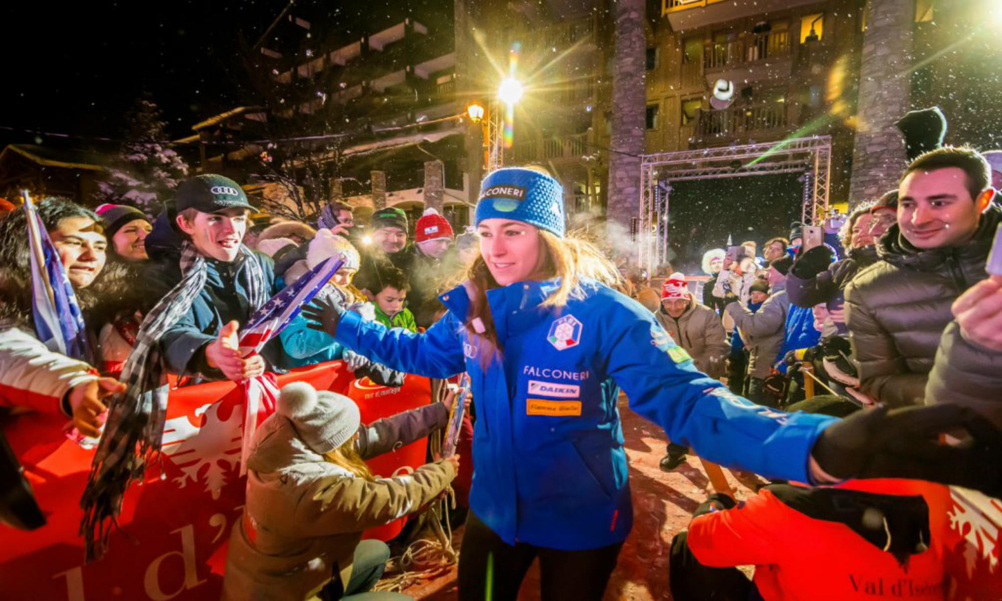 A ski champion goes through the partying audience in Val d’Isère.