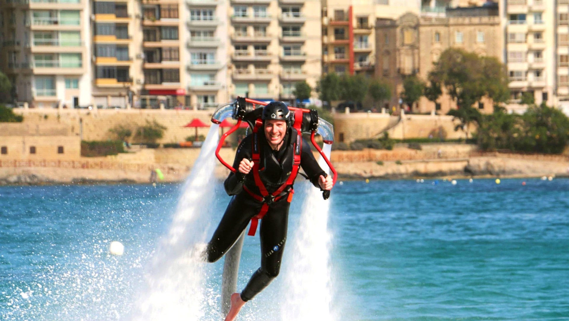 A guy's flying with a Jetpack in Malta.