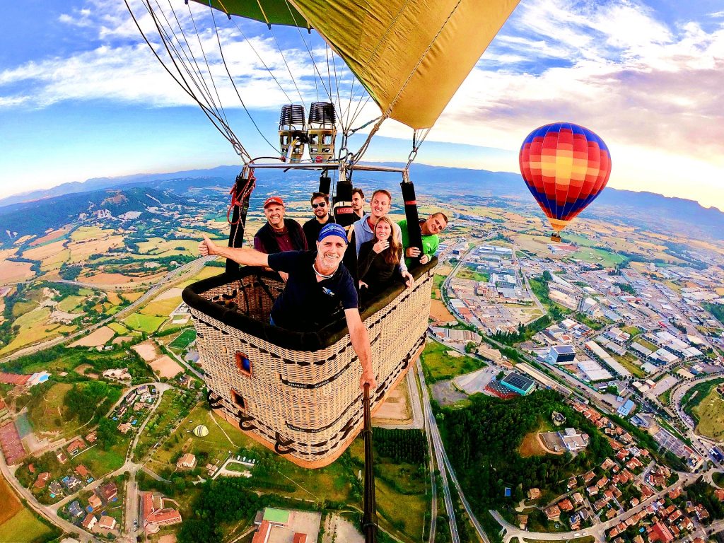 A group of people take a balloon ride near Barcelona, a beautiful outdoor activity around Barcelona.