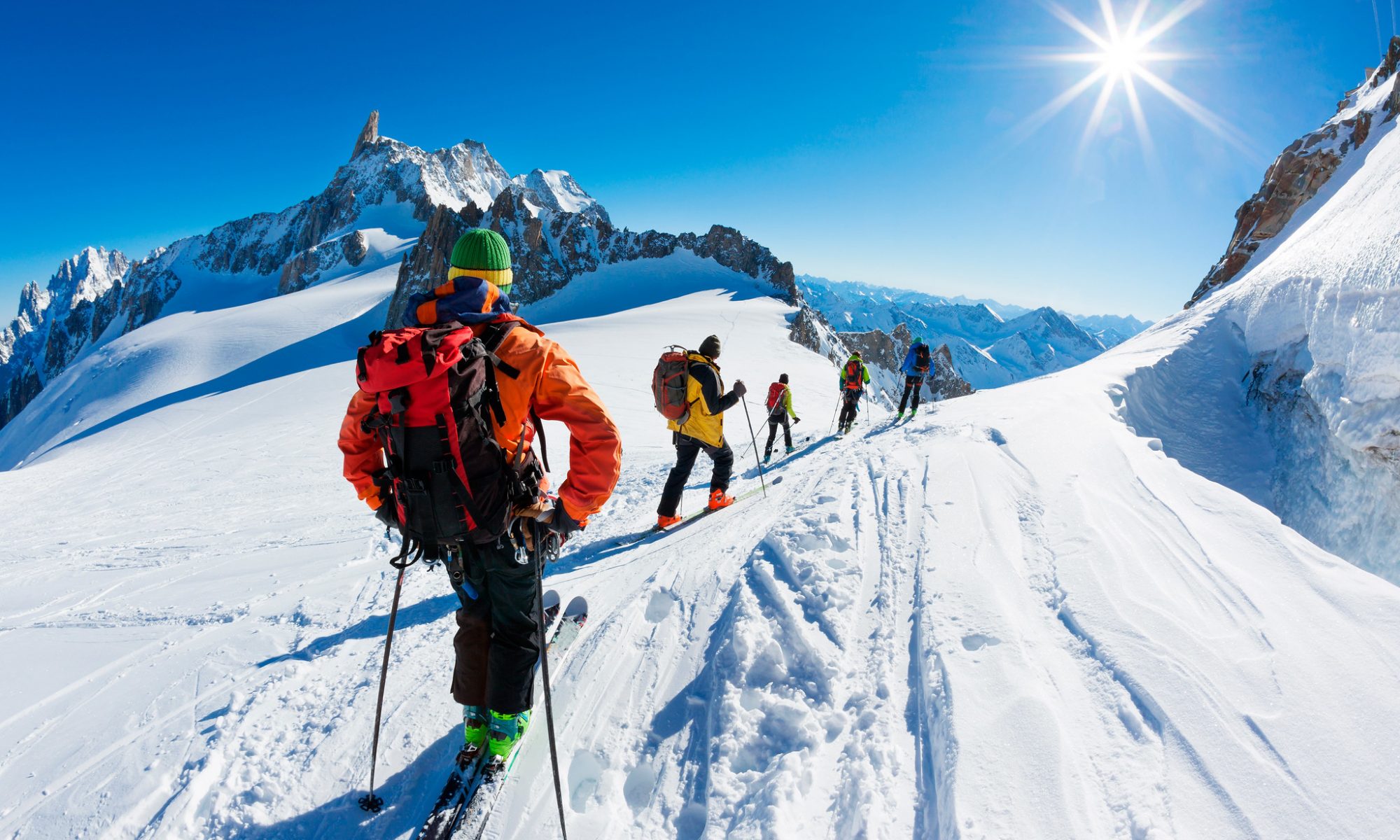 A group of skiers in the mountains of Chamonix Ski Resort.