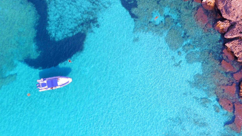 A panoramic view of the Punta Prosciutto beach, perfect for snorkelling.