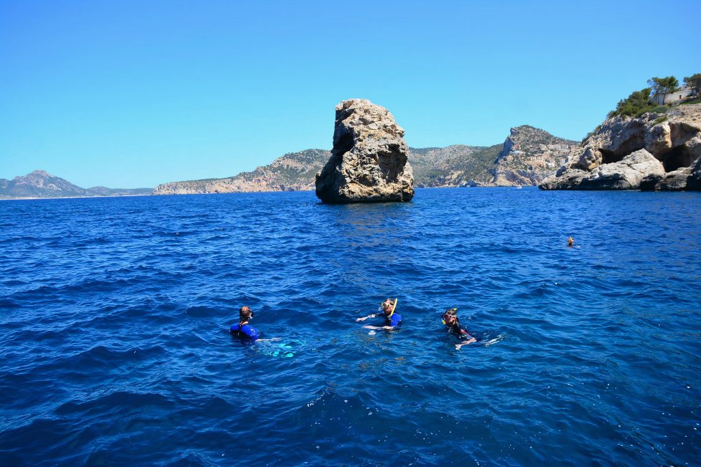 A group of people go on a snorkeling trip near Port D’Andratx.