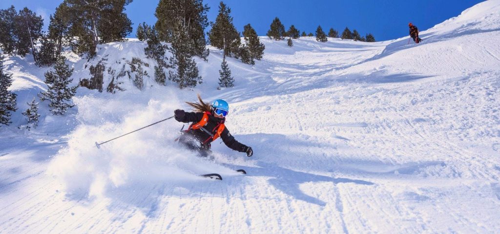 A woman is enjoying the empty slopes of Sierra Nevada, Europe’s most southern ski resort and a great spot for skiing in Spain.