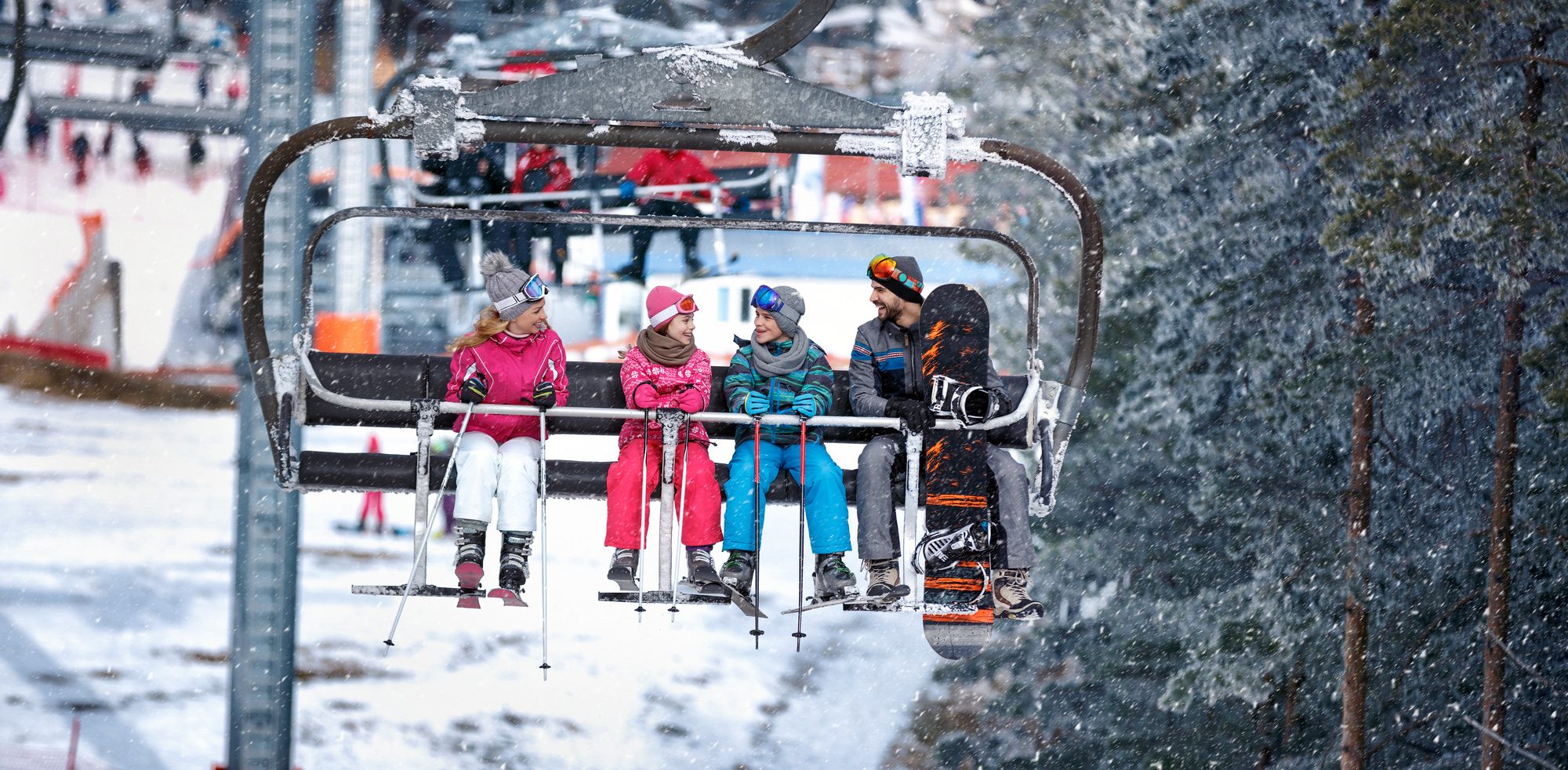A family is enjoying its family ski trip in France, where their kids learn how to ski.