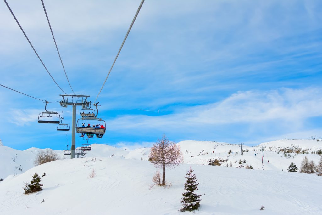People go skiing in La Joeu Du Loup during the winter season. 