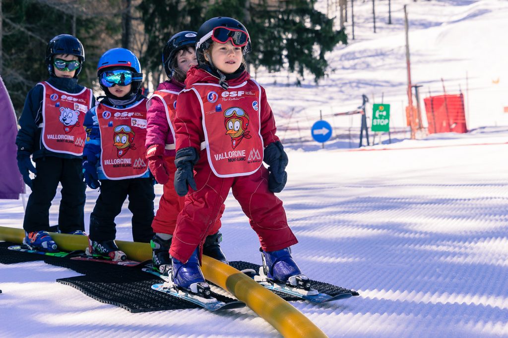 Kids enjoy a ski lesson with ESF Vallorcine ski school during the holidays. 