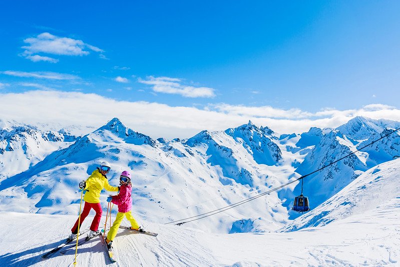People are enjoying the view while skiing in the 3 Valleys.