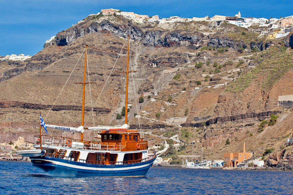 Caldera's Boat boat during an outing in the coast of Santorini. 