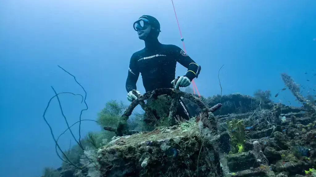 A diver roleplaying as the captain of the Nahoon.