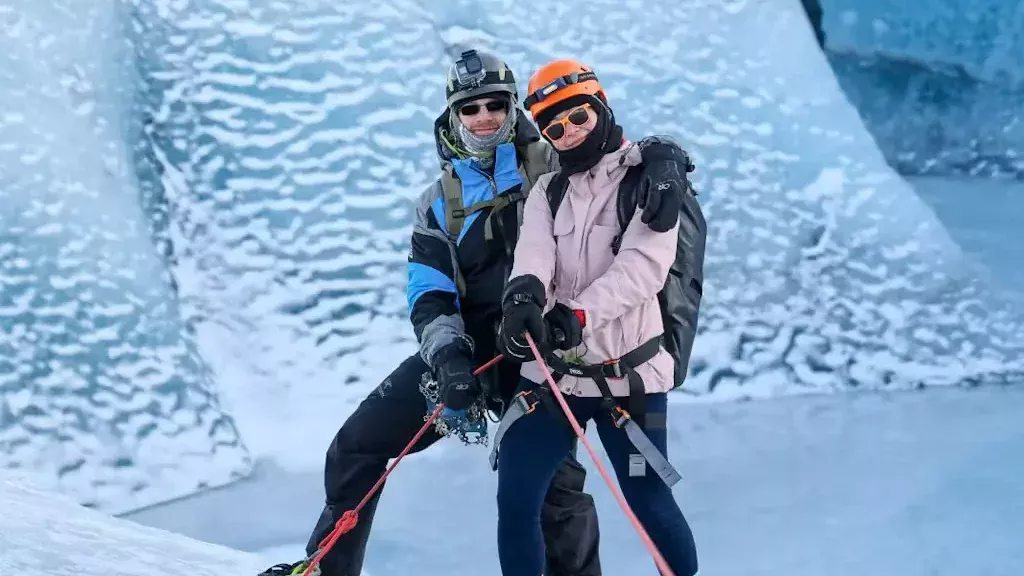A couple during an excursion in an Ice Cave.