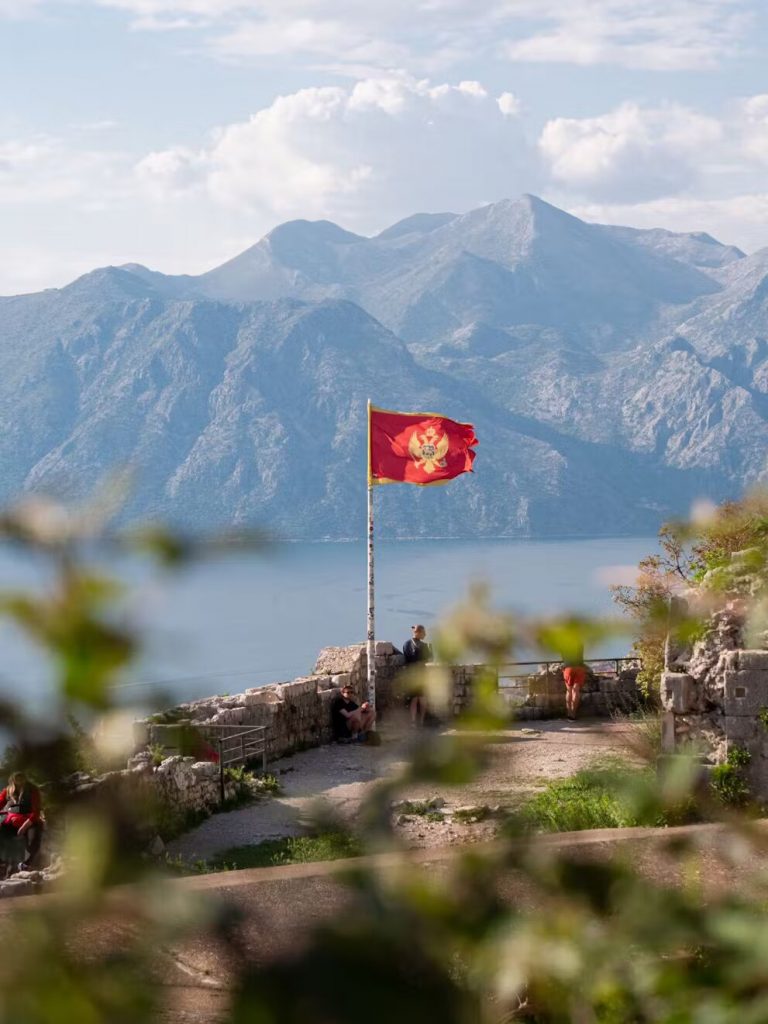 A view on the Bay of Kotor with mountains in the background.